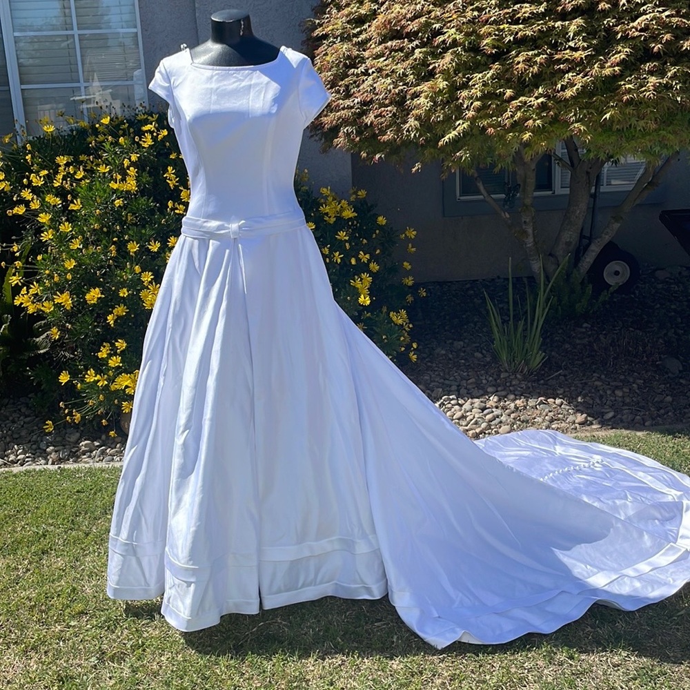 Elegant Full Length Short Sleeve dress with bow detail, button back, long train